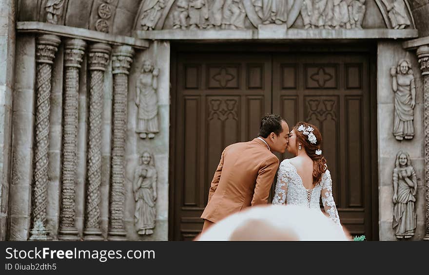 Couple Near on Wooden Sash Door