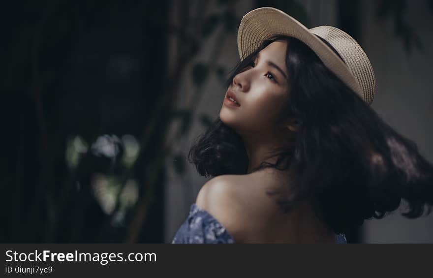 Woman Wearing Brown Hat