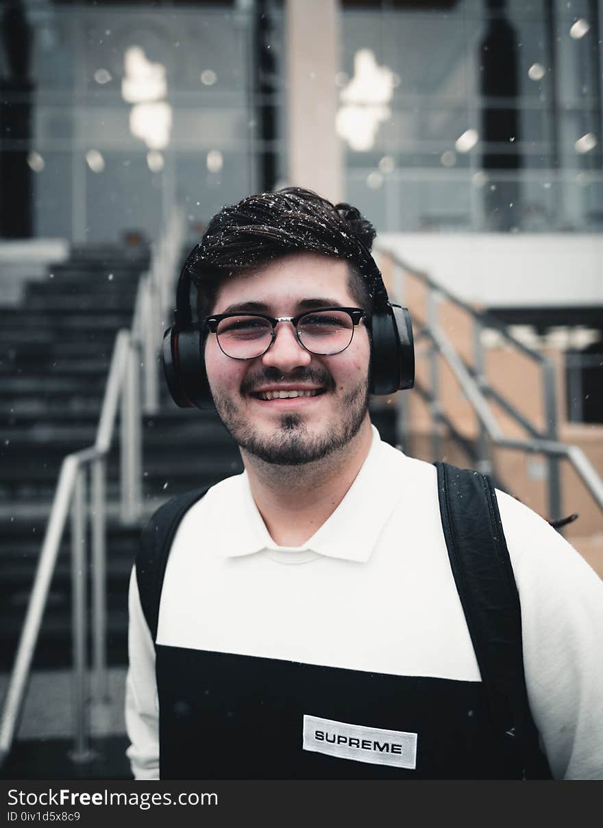 Man Wearing Headset and Smiling