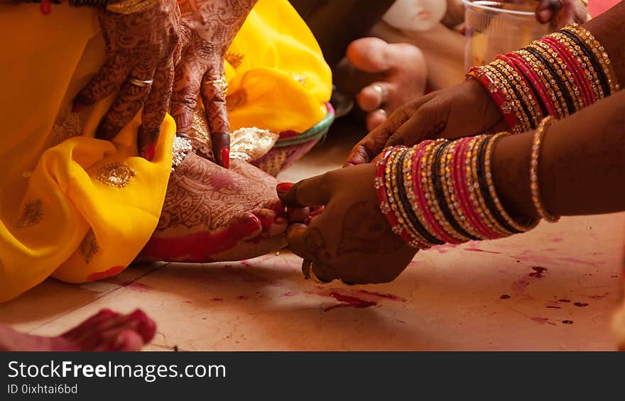 Bride feet coloring ceremony, a Hindu wedding ritual