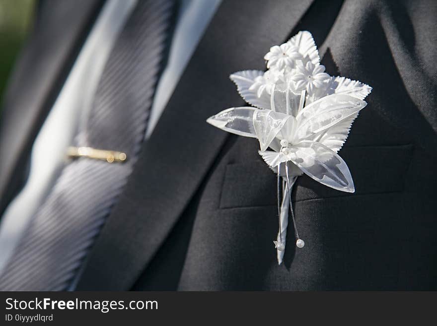 Wedding boutonniere on suit of groom