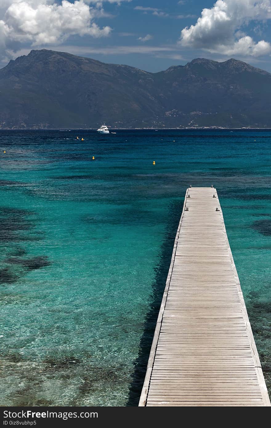 Wooden Pier On Mediterranean Sea