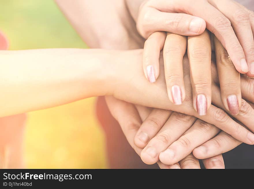 Three hand friends holding together ,unity,business teamwork,friendship,partnership concept background. Three hand friends holding together ,unity,business teamwork,friendship,partnership concept background