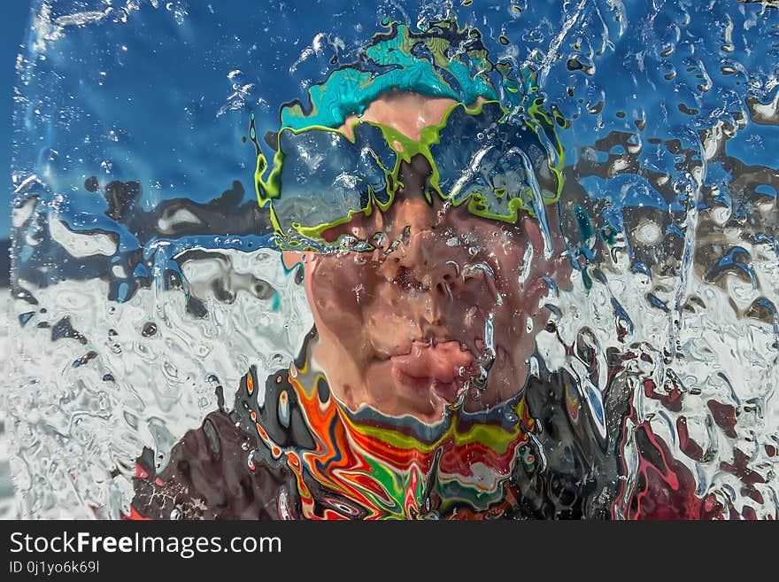 Girl looks through a transparent ice floe on the lake baikal