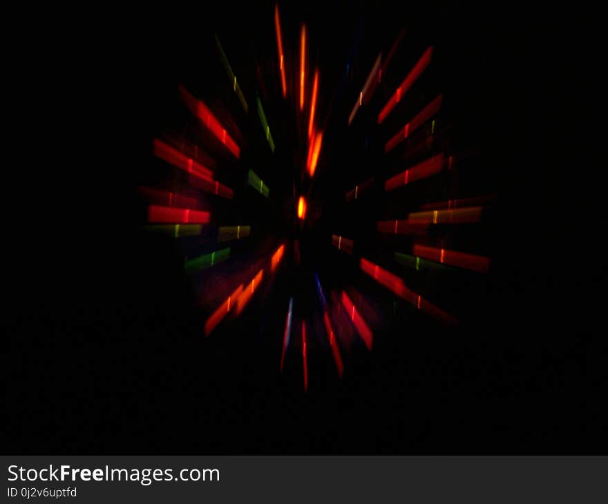 Colorful light ball glowing on black background. Colorful light ball glowing on black background.