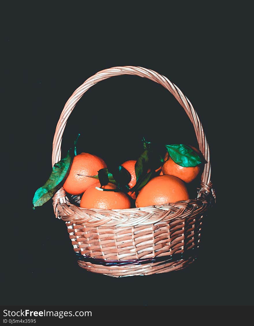 Tasty fresh orange mandarins on black background, filtered. Tasty fresh orange mandarins on black background, filtered.