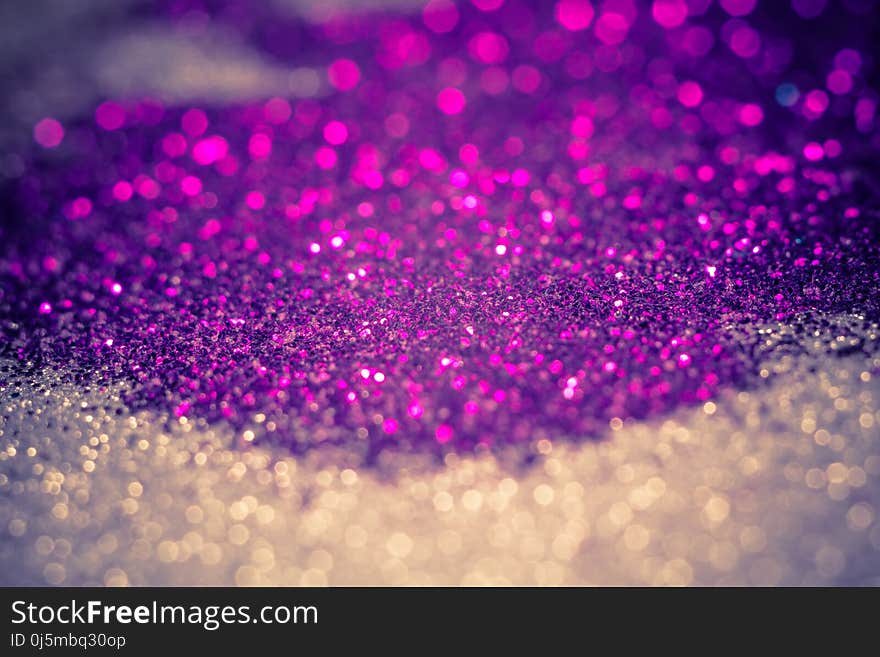 Decorative glitter silver and purple as abstract filtered background. Decorative glitter silver and purple as abstract filtered background