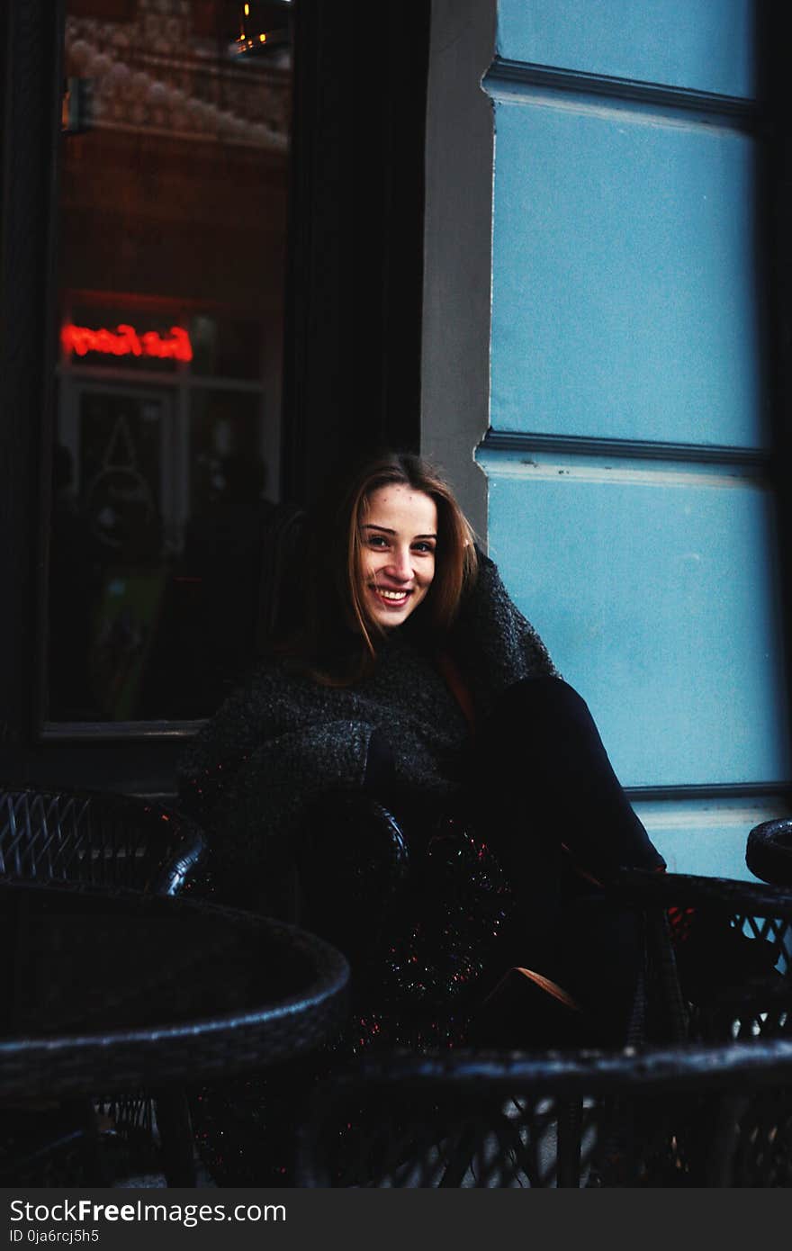 Woman Wearing Blue Crew-neck Sweater and Pants