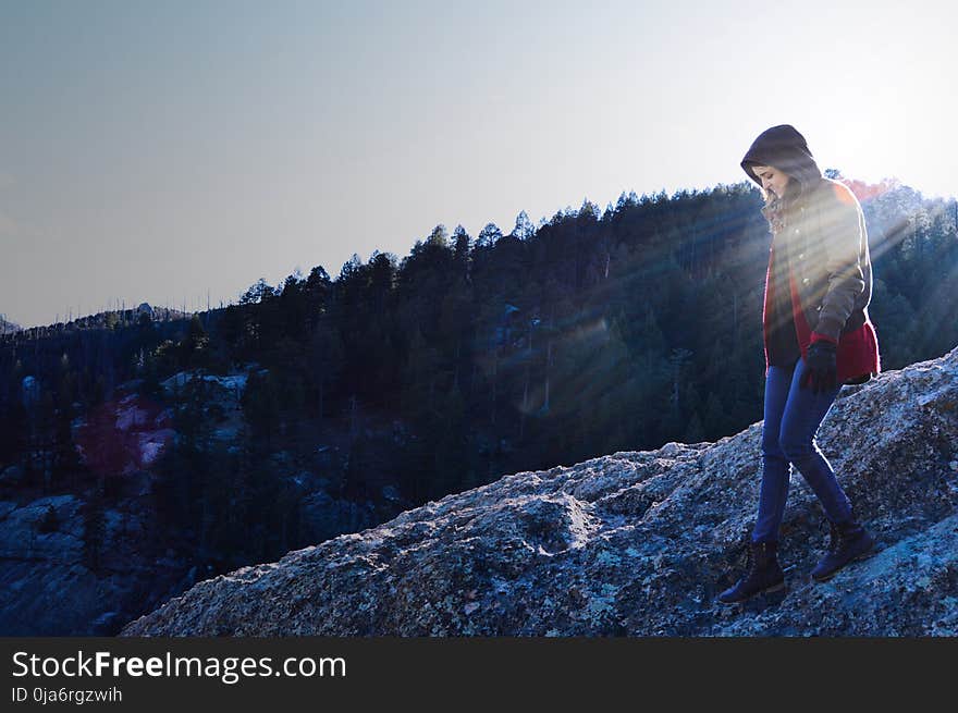 Woman Walking On Mountain