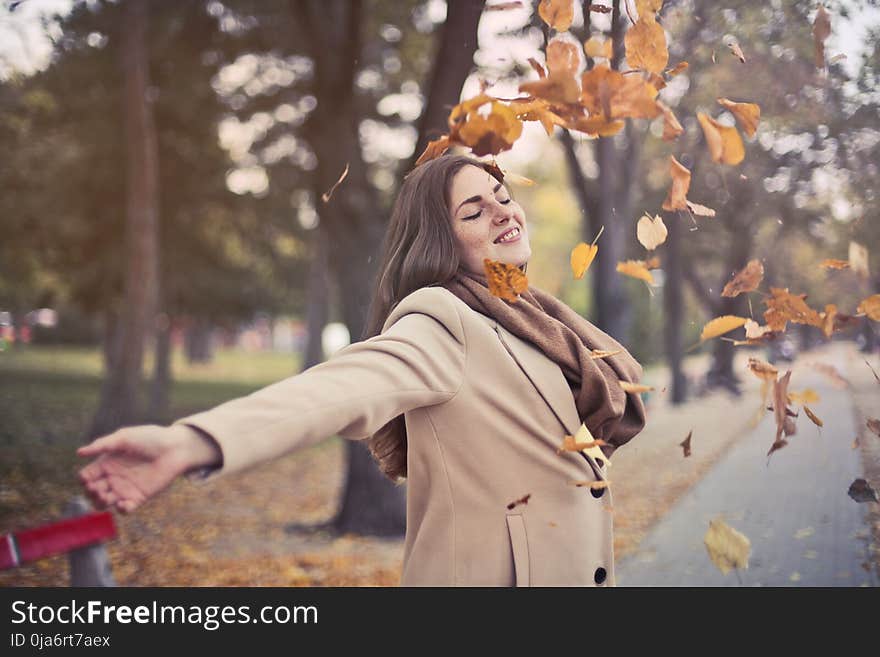 Woman In Brown Coat