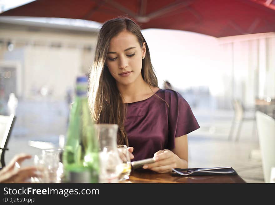 Woman Sitting On Chair