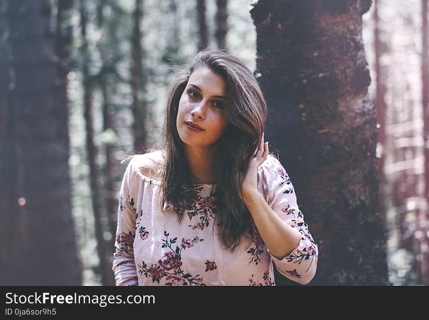 Woman In Floral Scoop-neck Blouse