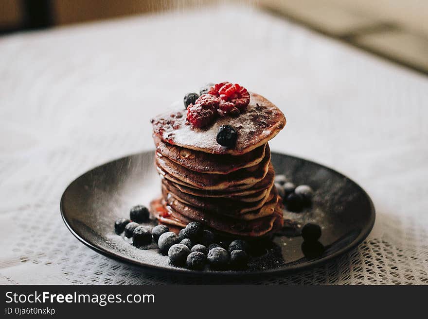 Pancakes With Blueberries on Black Plae