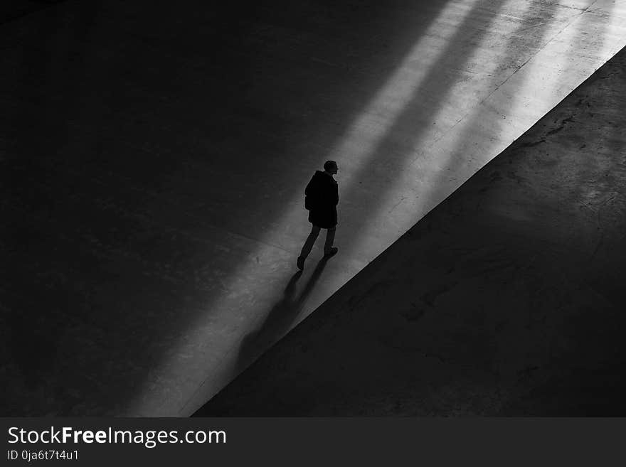 Man Walking on Floor