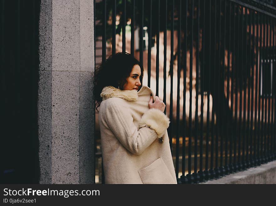 Woman Wearing White Fur Coat