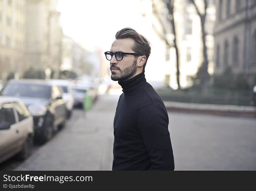 Man Standing on Street