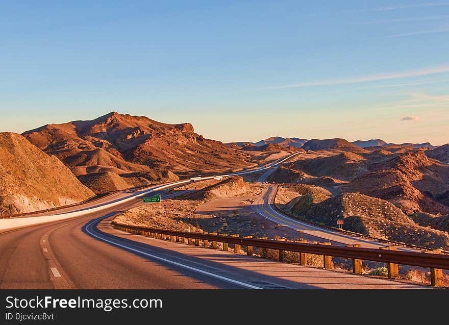 Landscape Photography of Rock Formation Near Highway