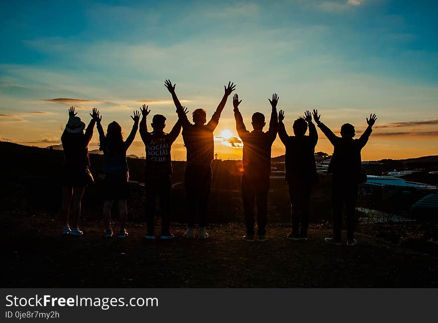 People Silhouette during Sunset