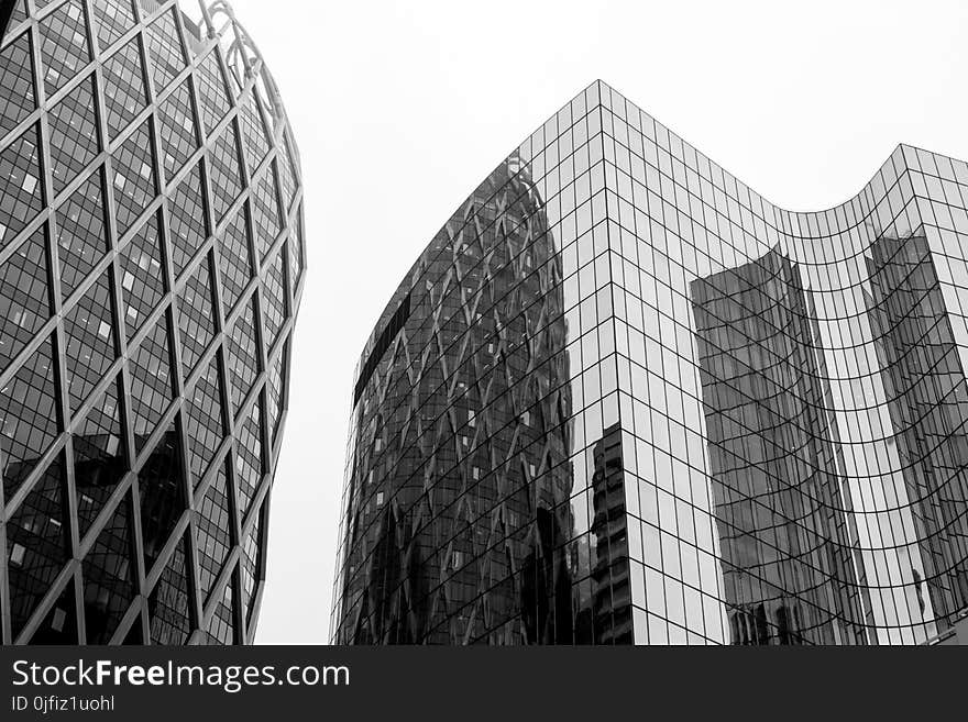 Greyscale Photo Of Glass Window Buildings