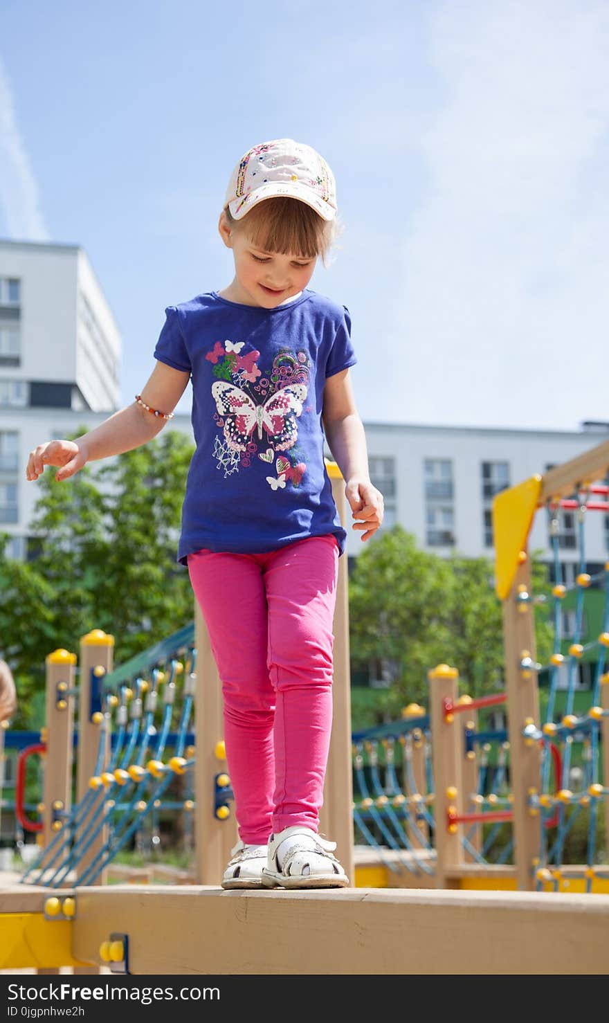 Active little girl on playground. Active little girl on playground
