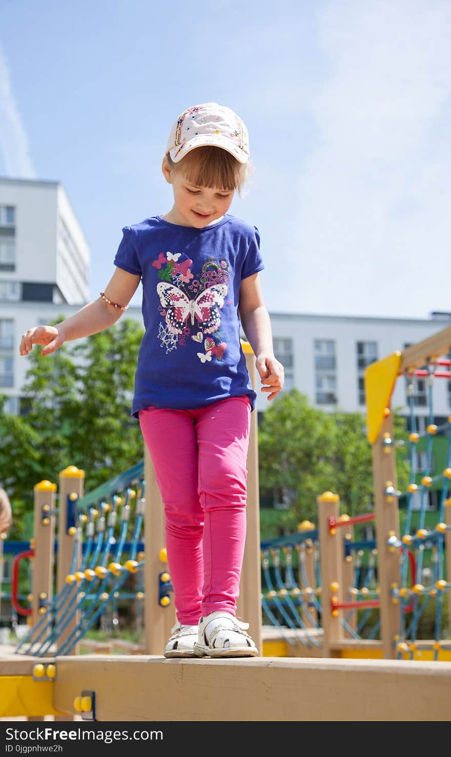 Pretty little girl on playground