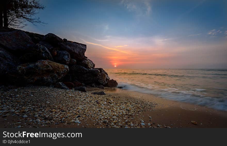 Seashore during Sunset Photography