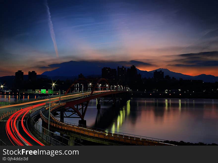 Light Rays on Bridge during Nighttime