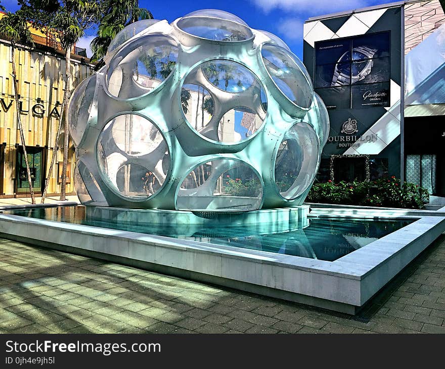 Grey Sphere With Round Holes Tourist Attraction