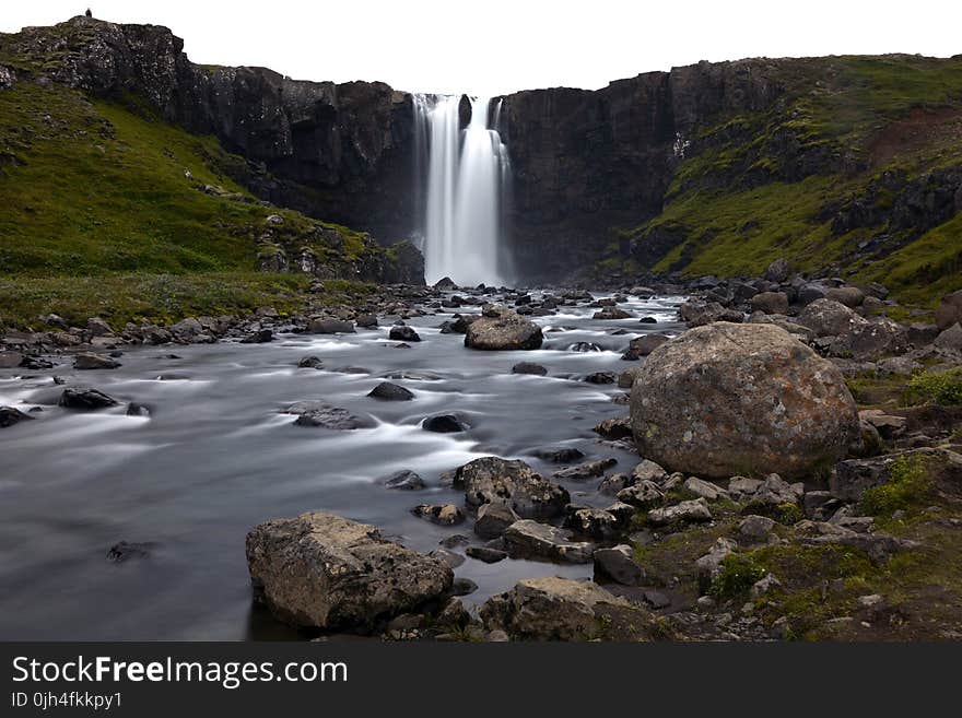 Timelapse Photography of Water Falls on Rock Cliff during Daytime