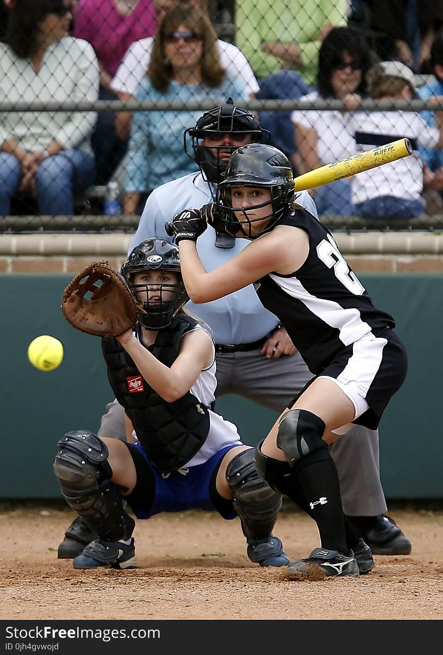 Two Female in Baseball Gears in Stadium Ready to Catch and Swing Baseball