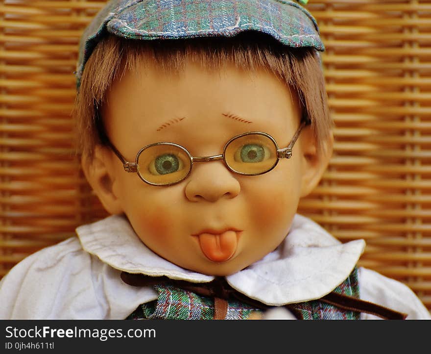 Doll Wearing Eyeglasses