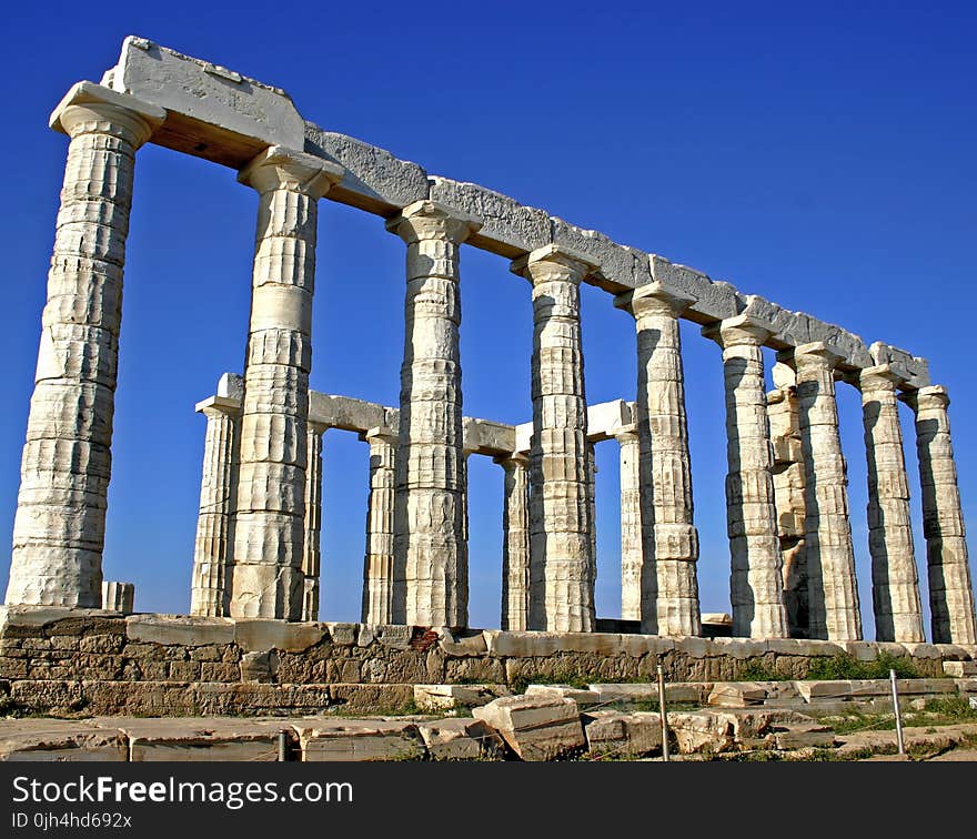 Concrete Pillars during Daytime