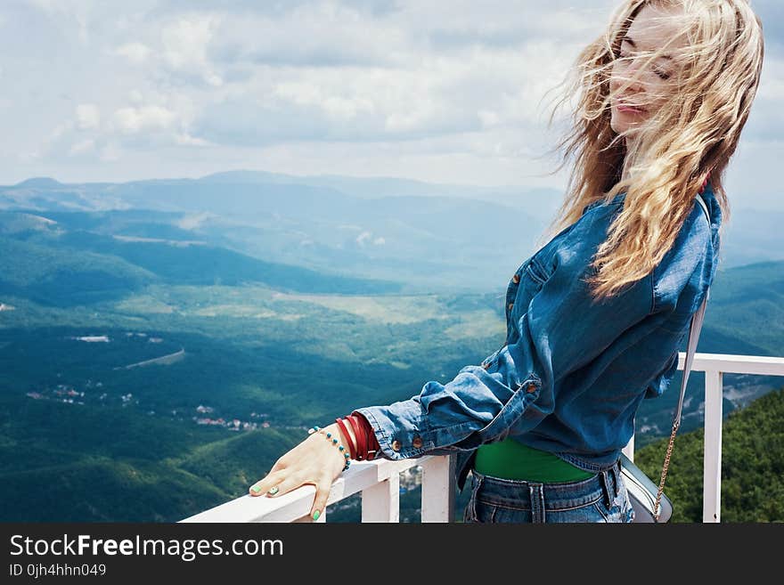 Woman in Blue Shirt Sightseeing