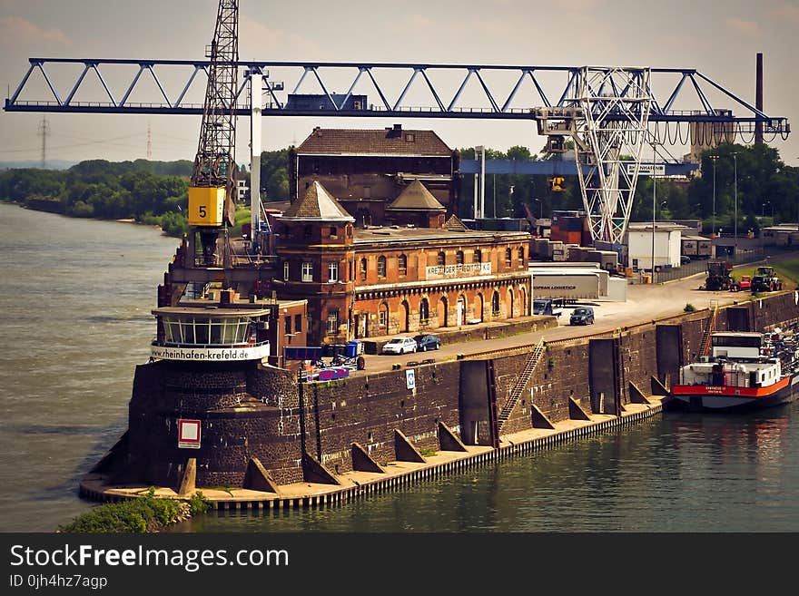 Brown Concrete Building on the Dock