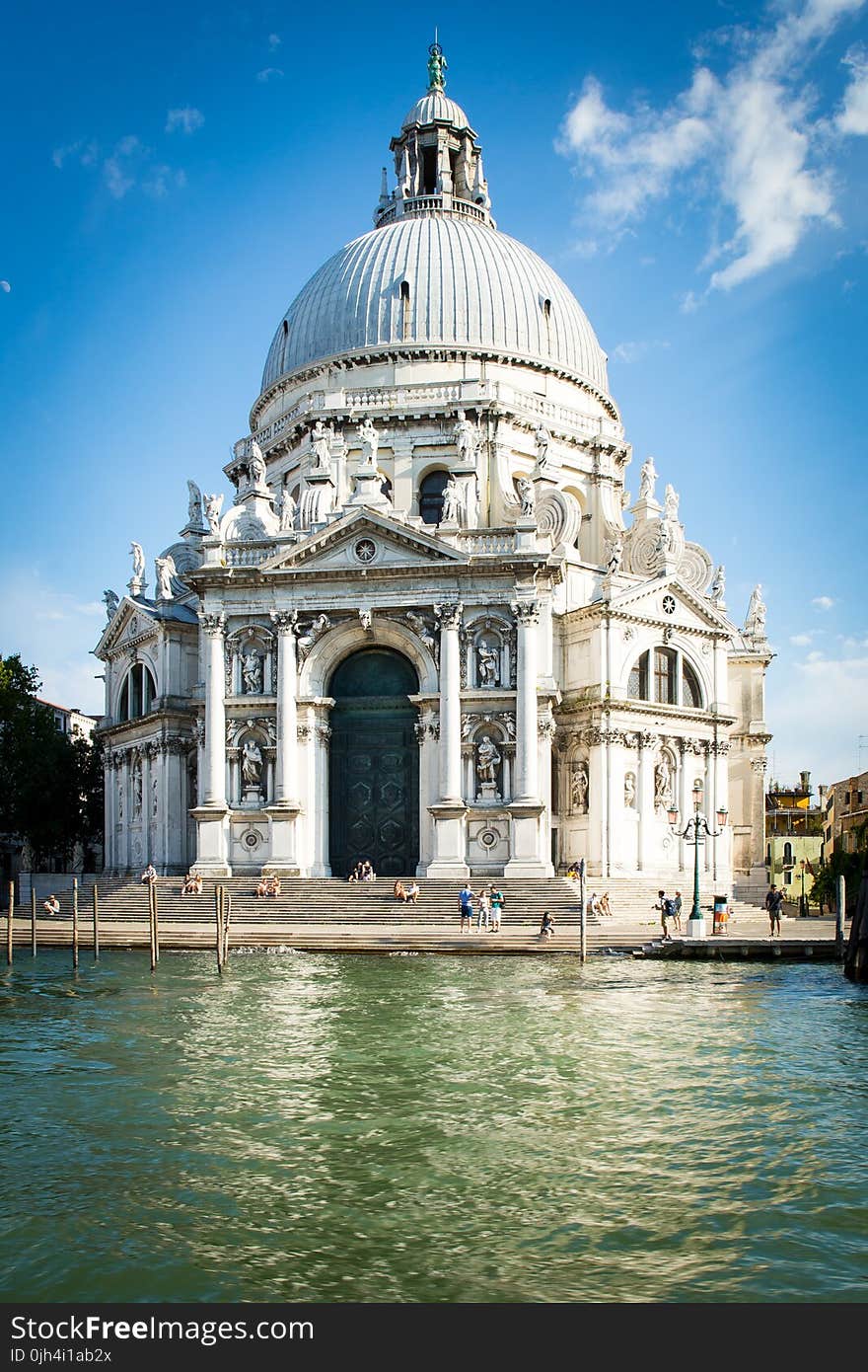 White Architectural Structure Beside Bodies of Water during Daytime