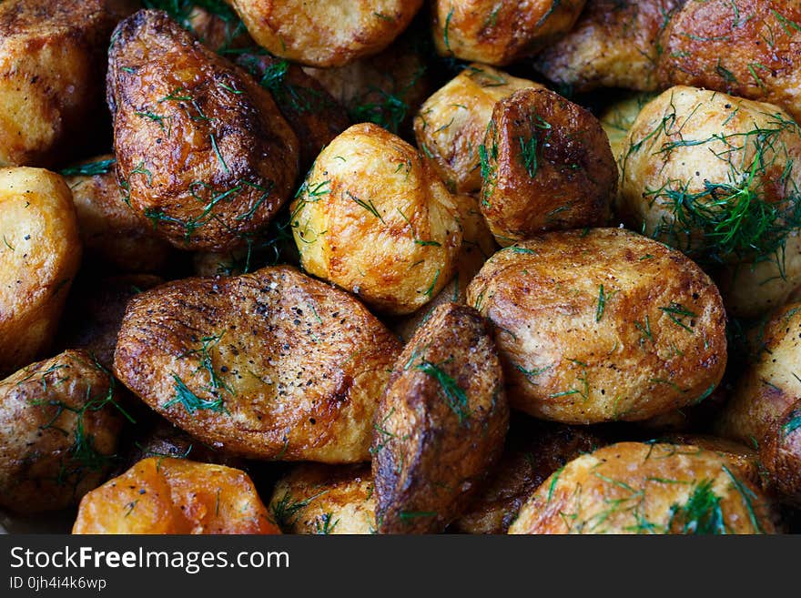 Baked Potatoes With Rosemary Garnish