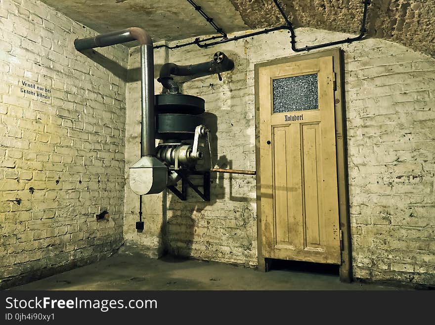 Black and Gray Metal Machine Inside a Room