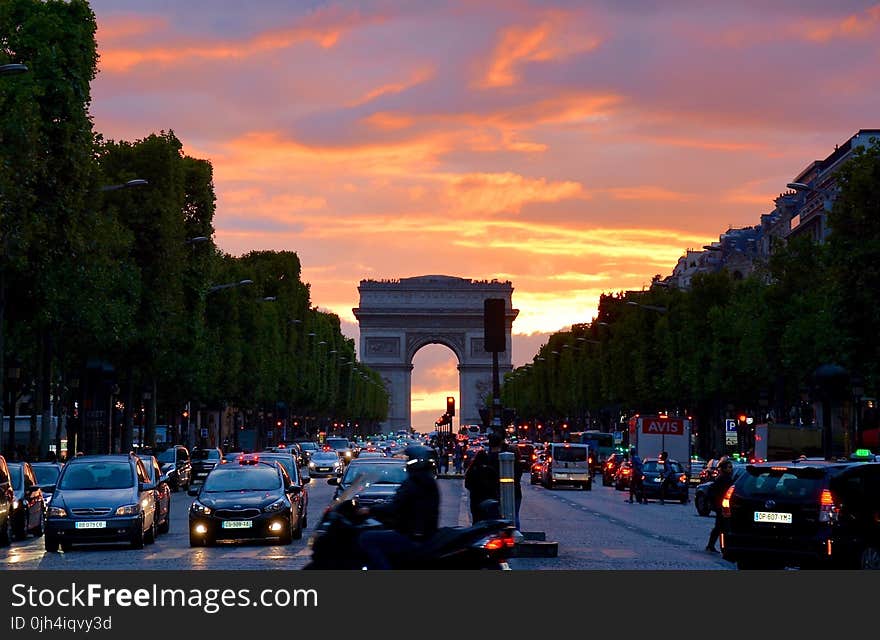 Crowded Street With Cars Along Arc De Triomphe