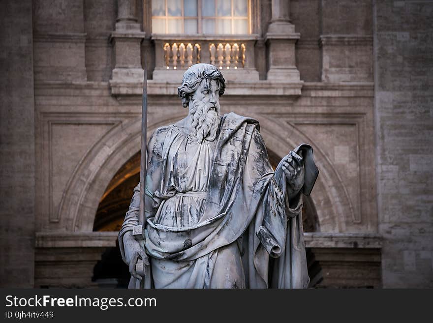 Gray and Black Concrete Statue