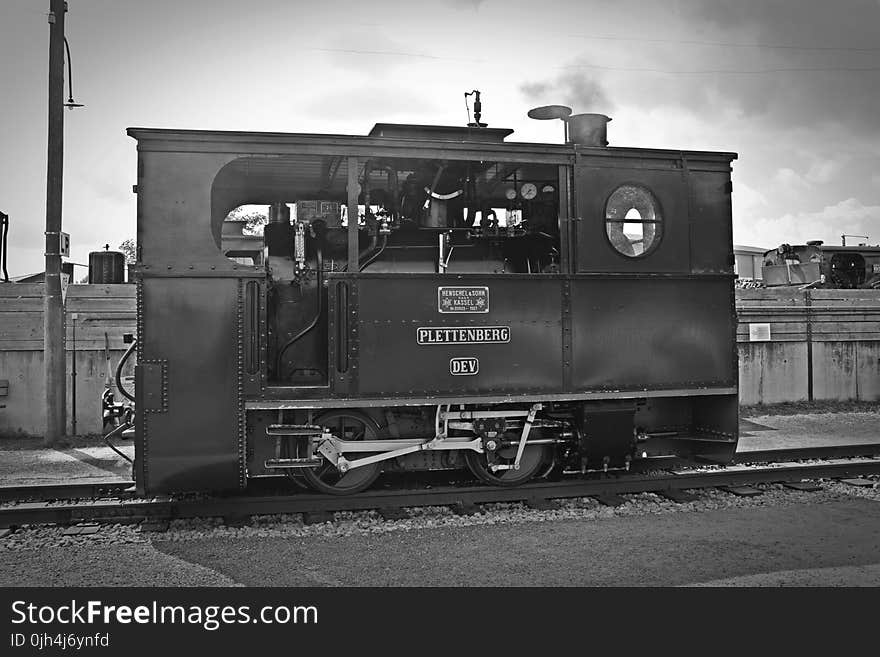 Gray Scale Photo of Classic Train