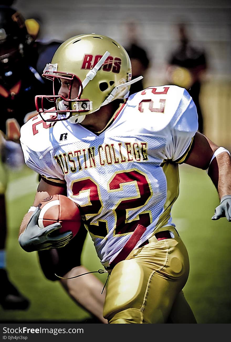 Man in White and Red Austin College 22 Football Jersey during Daytime