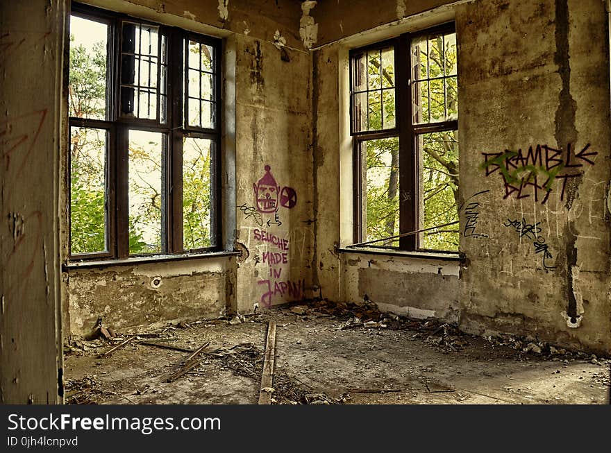 Brown Concrete Room With Windows during Daytime