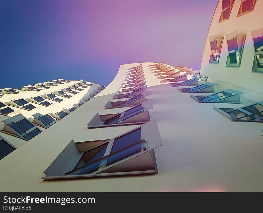 White Building Under Blue Sky