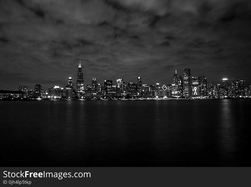 Gray Scale of City Skyline Photography