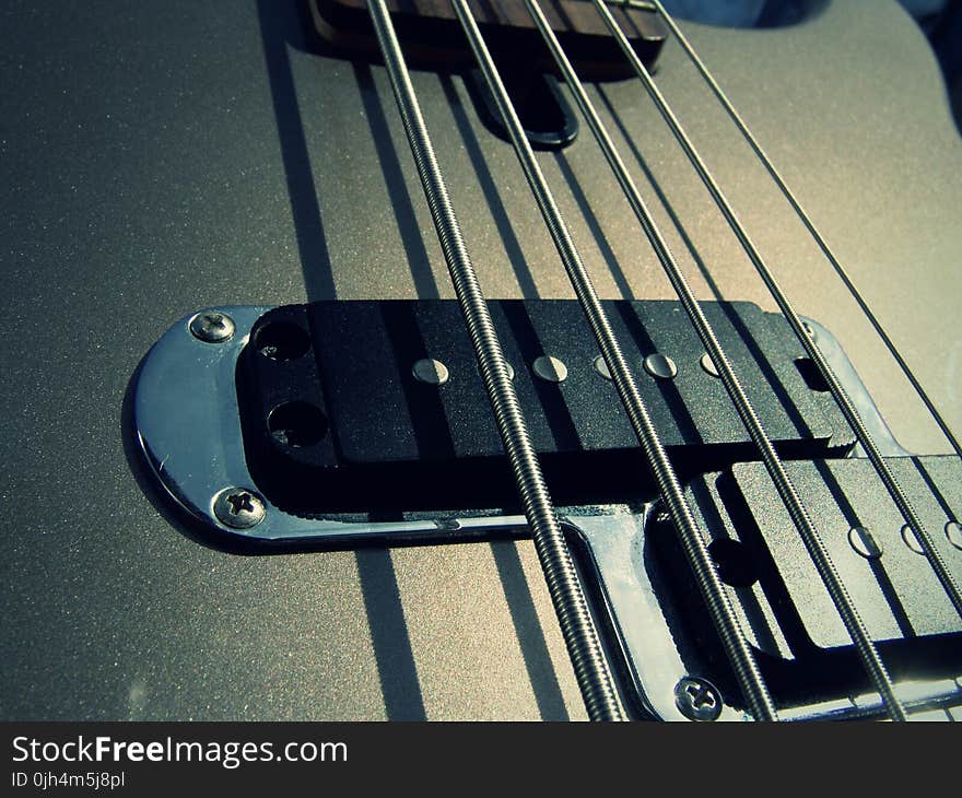 Black Electric Guitar in Closeup Photography