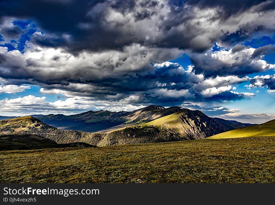 Landscape Photograph of Green Brown Hills at Daytime