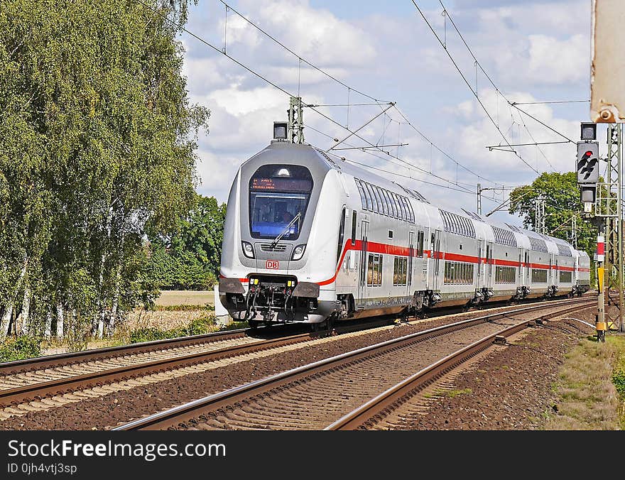 Gray and Red Train during Daytime