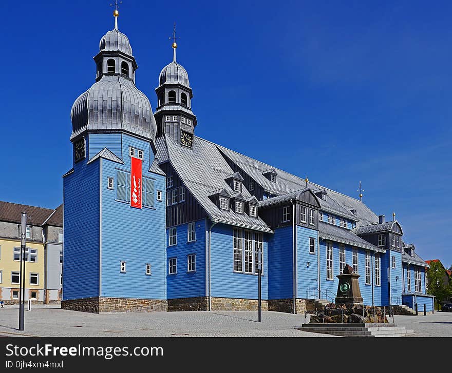 Blue and Gray Painted Building Landmark