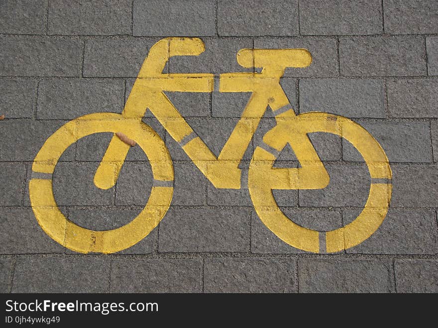 Bicycle Lane on Gray Concrete Road