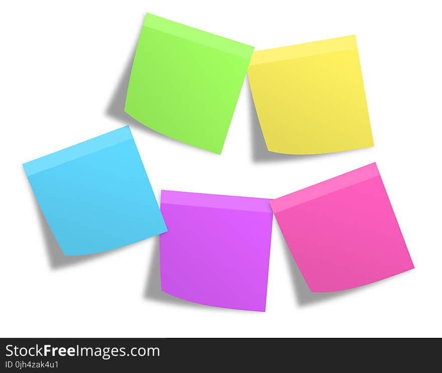 Pink Green Yellow Blue and Purple Sticky Note Mounted on White Painted Wall